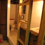 Here's the framed (but not finished) basement. Sink, toilet, lighting.