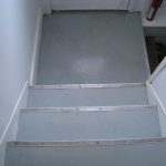 Clean, gray stairs and landing. This photo was taken after 3 months of wear. Holding up well.