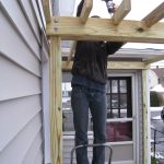 Screwing the top boards in place. 