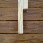 Notched end of the post. This end overhangs the side of the deck and was bolted securely in place. 
