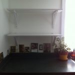 Finished shelves to the left of the sink. 