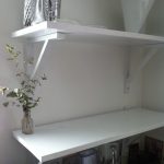 The finished shelves to the right of the sink. So clean.