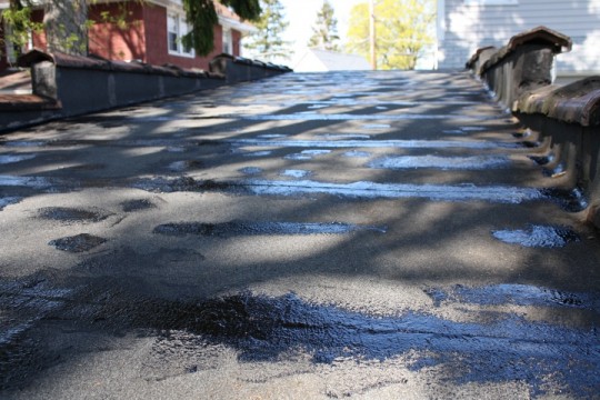 Tar applied. Looking good. Spotty.