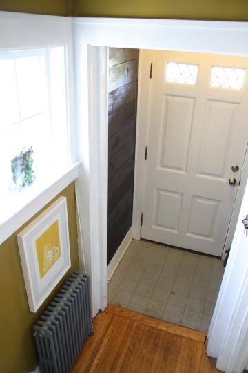 Eyes on the wall, not on the eternally dirty cement entryway.