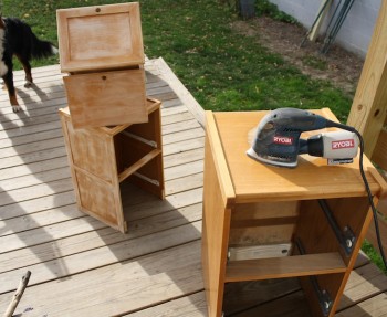 Preparing office drawers for painting.
