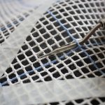 Step 1: Thread tool beneath a single section of the grid.