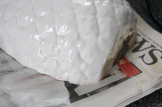 Creating a more sturdy base with hot glue.