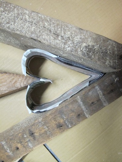 Heart mold, reinforced with scrap wood.