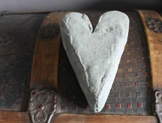 Finished portland cement doorstop.