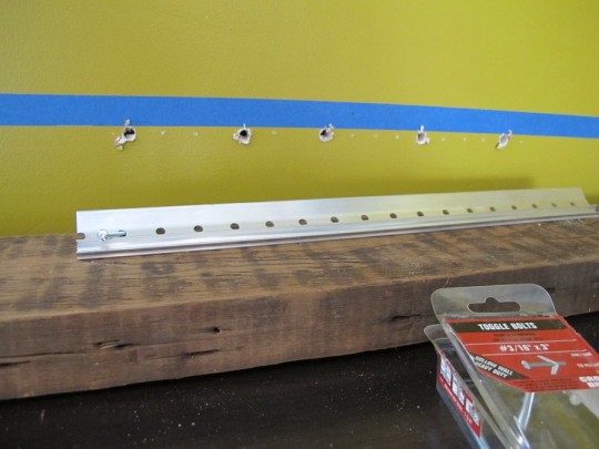 Mounting the french cleat to plaster using anchor bolts. Mounting the french cleat to plaster using anchor bolts.
