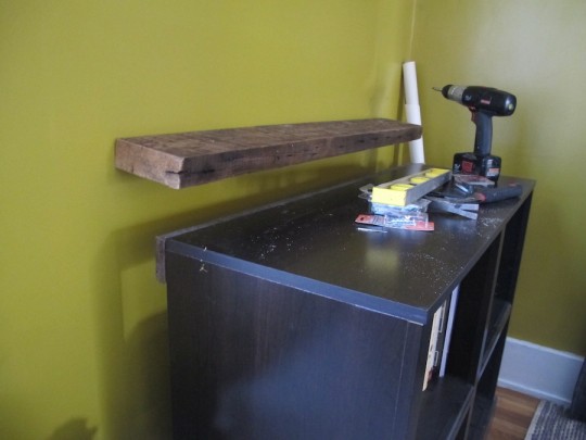 Whomp, whomp. A tilting floating shelf. Whomp, whomp. A tilting floating shelf.