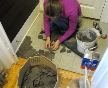 Installing a stone entryway.