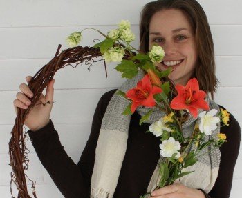 Wreath with fake flowers.