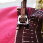 Sewing a reinforcement along the pillow seat.