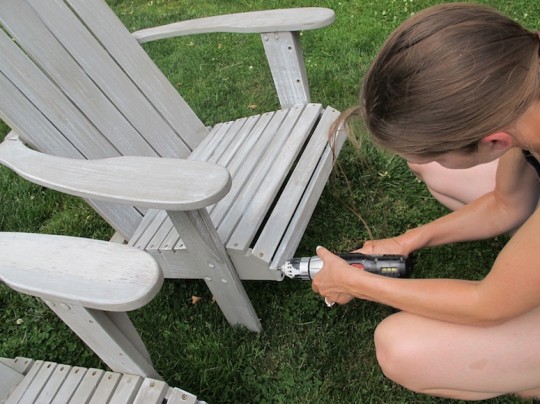 Tightening up the screws and bolts on the chairs.
