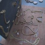 Glue your mirror down to the plywood using mirror adhesive.
