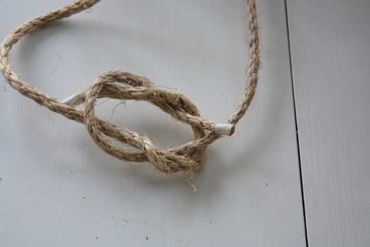 Making a square knot.