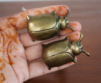 Beetle drawer pulls.