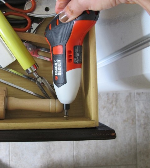 Workin' the GYRO drill in a tight drawer space. Our bigger drill would have been a total pain in here.