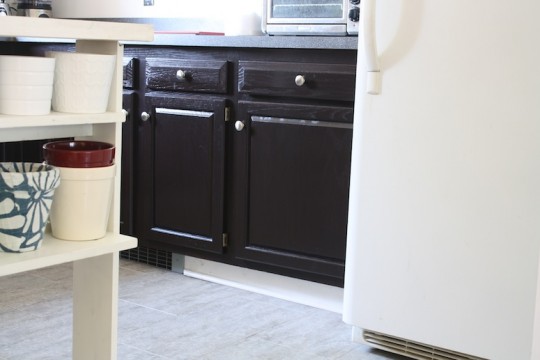 Stained kitchen cabinets.