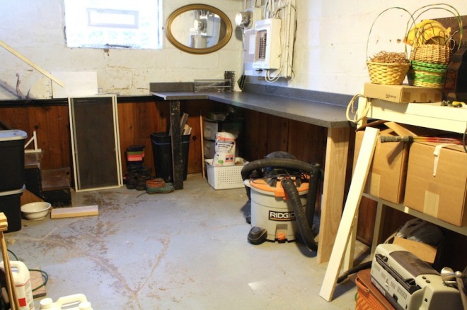 New storage in the basement, thanks to leftover laminate countertop.