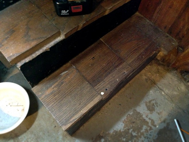 Repaired basement stair. Repaired basement stair.