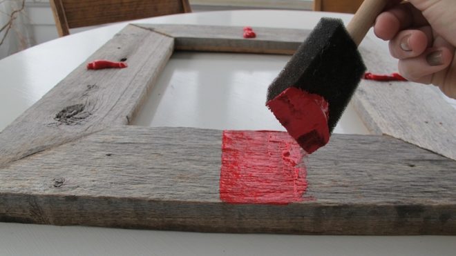 Customizing a barnwood picture frame.