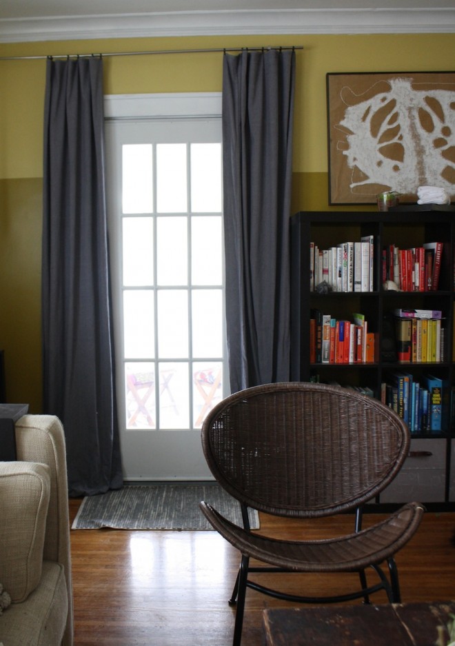 Toning down the living room with dark gray painter's cloth curtains. Toning down the living room with dark gray painter's cloth curtains.
