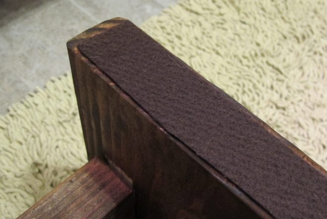 Each foot of the stool was lined with felt to cushion against the floor. Each foot of the stool was lined with felt to cushion against the floor.