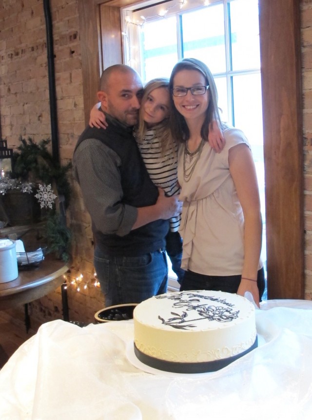 Pay no attention to weird shadows and bulky shirt layers, it's the only photo we have of the three of us at our wedding shower.