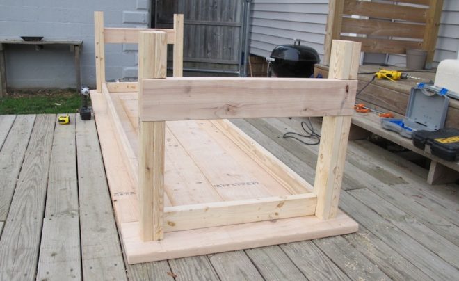 We attached the legs to the outside of the frame using additional pocket screws.