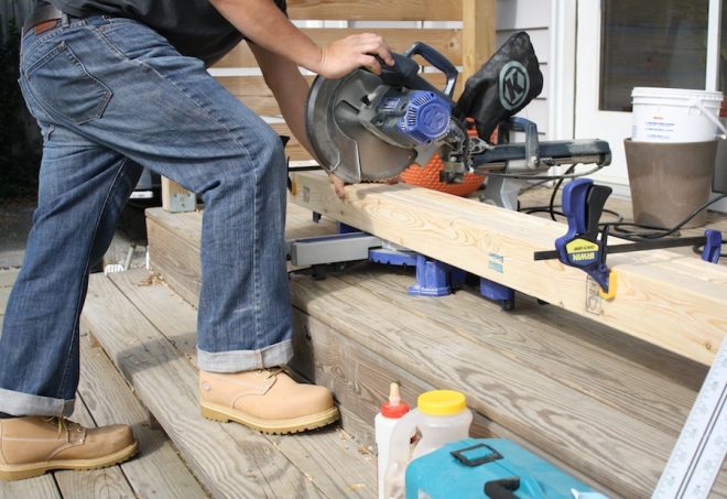 Trimming the 2x4s to an even length to become legs.