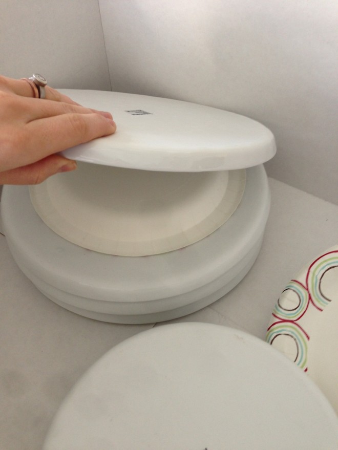Use paper plates between your good dinnerware when storing it away.