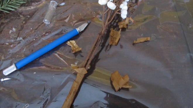 Deconstruction the faux Tallow berry branches for my DIY bouquet.