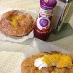 Typical breakfast. Pastries, coffee, fruit juice.