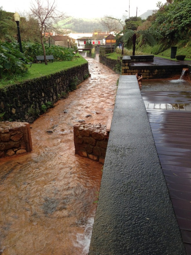 Hot spring diverting into pools in Furnas, Azores.