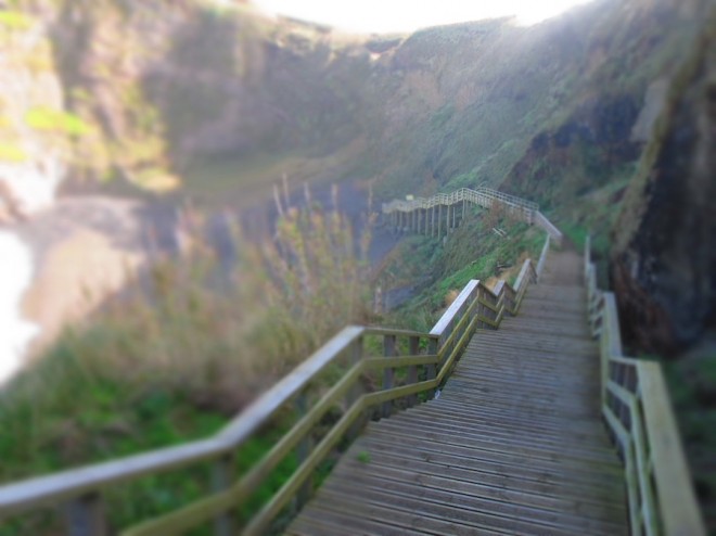 Walking to a black sand beach. // miniature effect