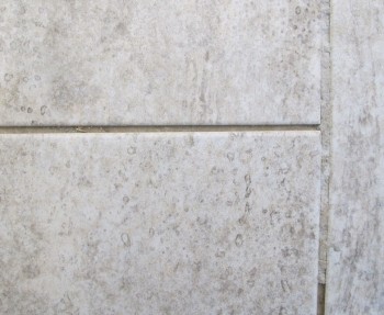 Eesh, what a crack job. Our kitchen grout has gone bad.